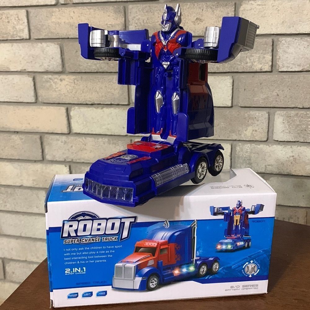 3for$20 NWT transformer truck blue sounds + light automatic rotation & turns